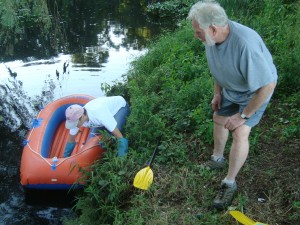 Don Cordner stands ready to intervene if needed at the first York Pond launch of the loosestrike expedition by Carrie Drake.