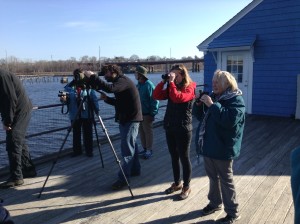 Dan Berard at the telephoto on the NBC boat house deck. Elena Riverstone on the right helped organize the outing.