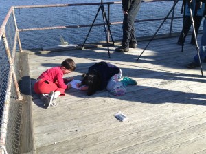 When the bird coloring books ran out, a seven-year-old named Penelope shared hers with a six-year-old named Linus.